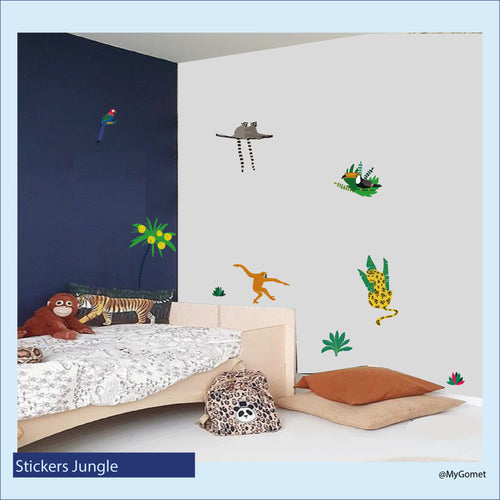 stickers représentant des animaux de la jungle de la collection MyGomet collés sur un mur d'une chambre d'enfant
